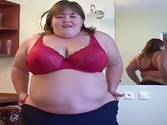 Young BBW strip teases