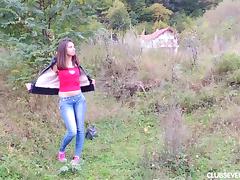 Long haired teen fingering her bald snatch outdoors