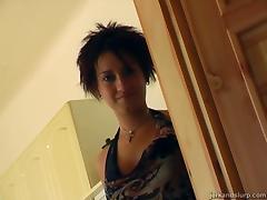 A cute girl with short hair jerks a guy off and makes him cum