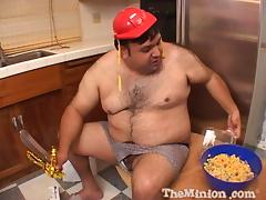 A fat guy eats food while getting to fuck a hot chick
