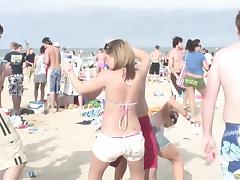 Radiant party girls let loose at a wild beach party