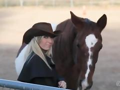 A lonely cowgirl meets a cowboy and fucks in the barn