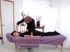 A shy girl seduced to have sex on the massage table
