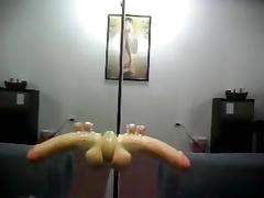 Oriental wife makes a great fuck with wall mounted marital-device