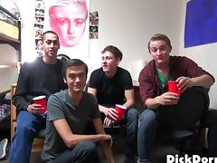 Skinny gay guy with glasses enjoying a hardcore gangbang