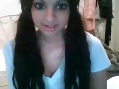 Pigtailed girl roleplays a sex fantasy online, masturbates with a hairbrush and talks dirty.