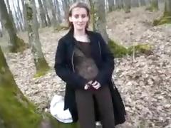 Shamelessly exhibitionistic slut is sucking my dick in the woods