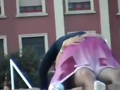 Voyeur tapes a crazy girl riding her bf upskirt at the beach