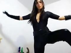 Sexy girl in catsuit plays