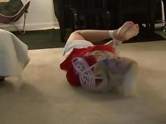 Cute coed struggles in tight hogtie