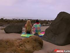 Rocky beach is a perfect place for the sexy blonde to ride the dick