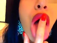 Beauty brunette caresses her pussy