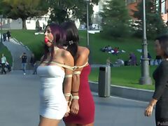 Coral Joice and Julia De Lucia tied up in public with ball gags