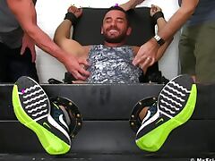 Gay Bruno Bernal enjoys a footjob with his handsome gay friends