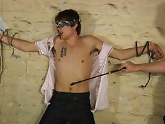 Older dude with glasses kisses and sucks a dick of a tied up dude