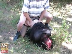 Redhead cock gobbler outdoors