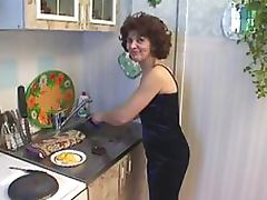 Teen Stud Fucks and Facializes Horny Mature Brunette in the Kitchen