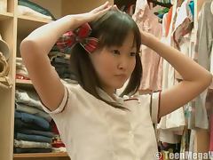 Asian teen dresses as schoolgirl