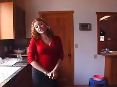 Playful curly chick sucks big black cock in the kitchen