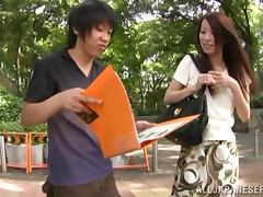Slim and pretty Japanese girl gets toyed in a car
