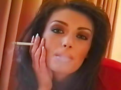 Brunette likes smoking and posing