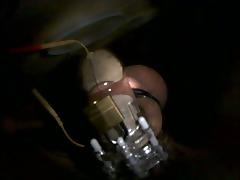 Estim cuming in chastity cage