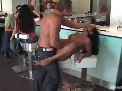 Gagged brunette chick rides a dick in some cafe