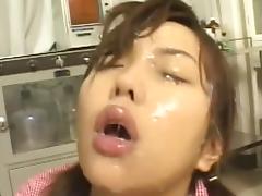 Sweetie Asian chick is swallowing some juice