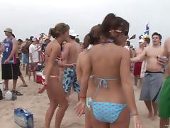 Amateur sluts in bikinis have fun on a beach in homemade clip